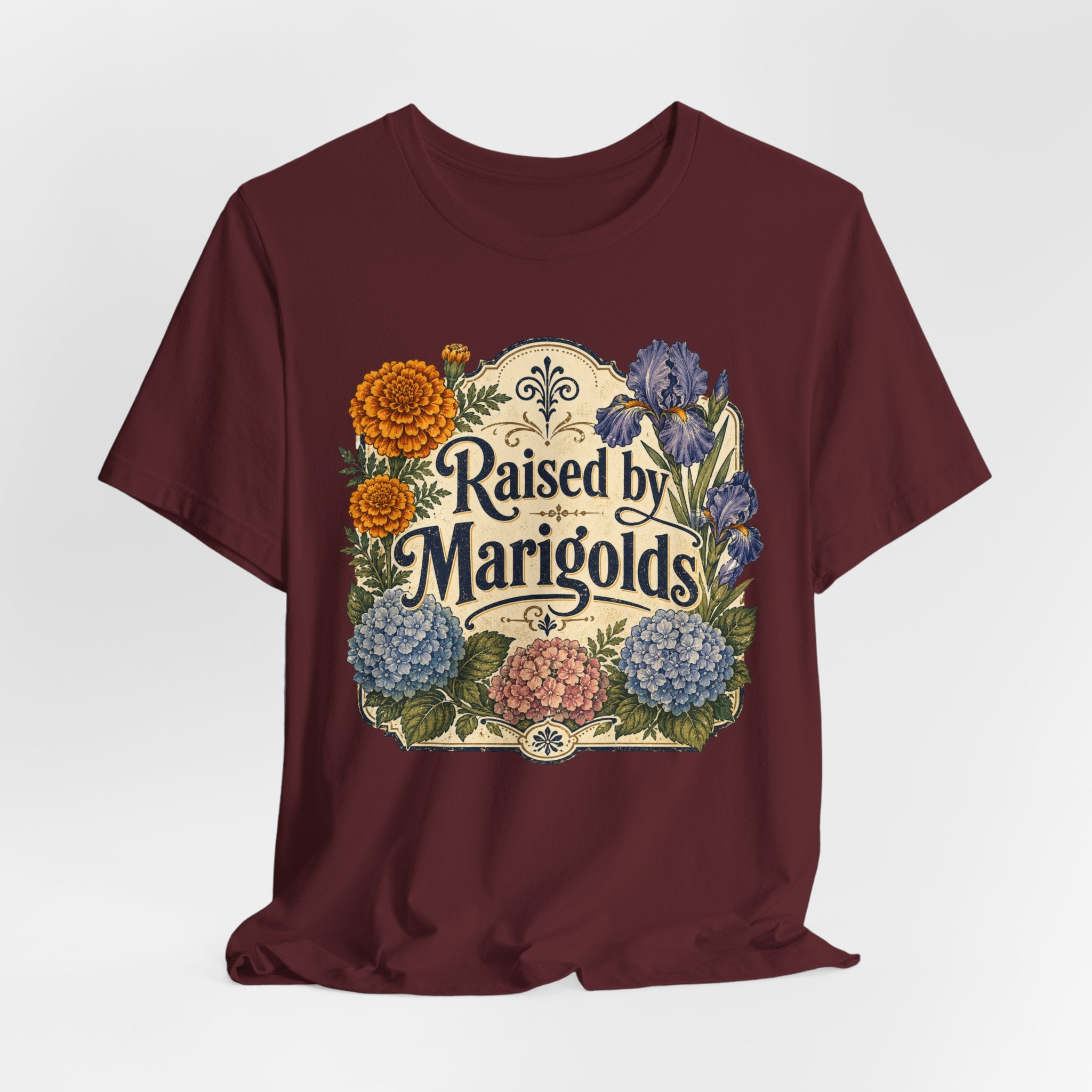 Raised by Marigolds Tee